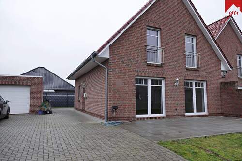 Ansicht Straßenseite - 4 Zimmer Doppelhaushälfte zur Miete in Großefehn