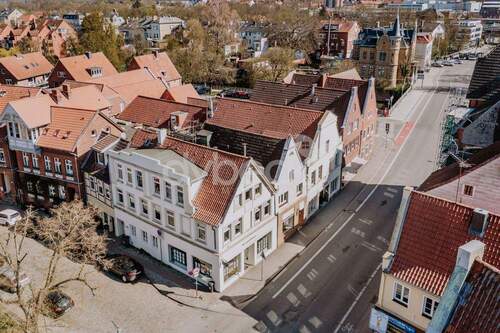 Außenansicht - Mehrfamilienhaus, Wohnhaus mit 103,00 m&sup2; in Lüneburg zum Kaufen