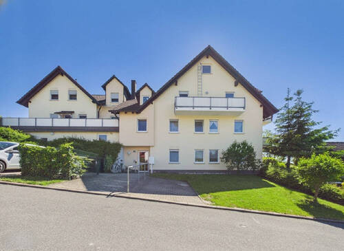 Bild1 - Split-Level-Erdgeschosswohnung mit Terrasse, Garten und Garage in ruhiger Lage
