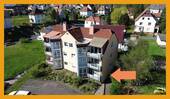 Luftbild - ERDGESCHOSS-WOHNUNG MIT NETTEN MIETERN! KEINE KÄUFERPROVISION!