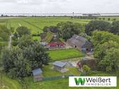Titelbild - Charmantes Reetdach-Anwesen nahe der Elbe - Wohnen, Ferienvermietung & Pferdehaltung auf 10.480 m² Grdst.