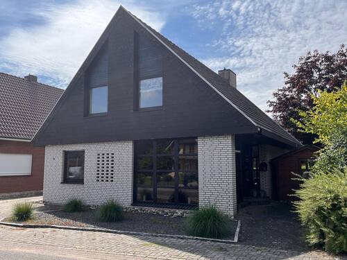 Rückwärtige Ansicht - Einfamilienhaus mit 121,00 m&sup2; in Georgsdorf zum Kaufen