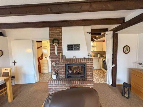 Wohnzimmer mit Kamin - 