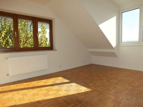 Helles Dachgeschosszimmer - 