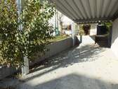 Einfahrt mit Carport - 