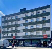 Wohn- und Geschäftshaus mit 12 Wohneinheiten und langfristig vermieteter Supermarkt-Gewerbefläche in Langenfeld