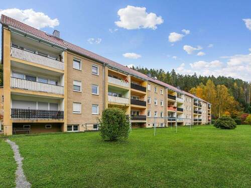 Außenansicht Haus a - 3 Zimmer Etagenwohnung zum Kaufen in Hohnstein / Kohlmühle
