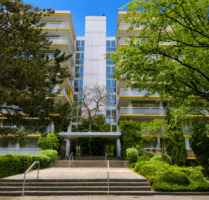 Wohnen über den Baumkronen: vermietete 2-Zimmer-Wohnung mit Loggia und TG-Stellplatz in München-Neuperlach