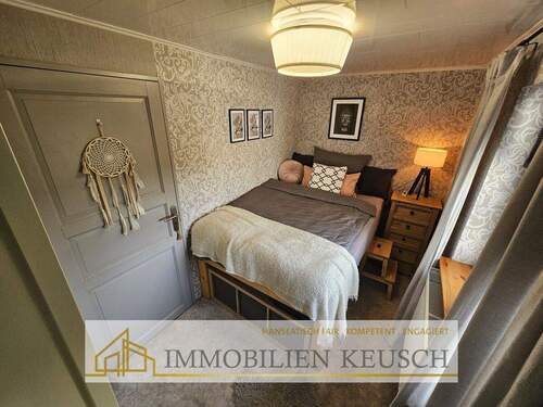 Schlafzimmer - Mehrfamilienhaus, Wohnhaus mit 36,80 m&sup2; in Hambergen zum Kaufen