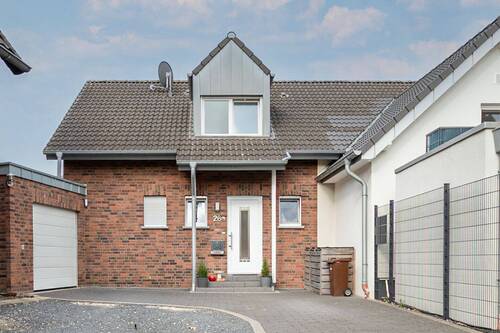 WWW.BOUWENS.DE - Familienidylle in Heinsberg-Lieck: Modernes Einfamilienhaus mit Garten & Kamin!