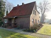Titelbild - Attraktives Sanierungsobjekt: Einfamilienhaus in naturnaher Lage von Apen