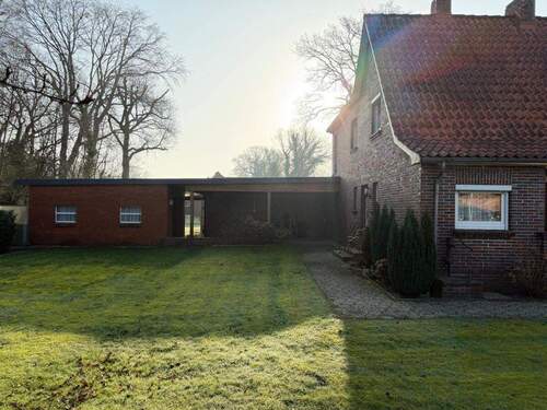 Seitenansicht - 9 Zimmer Einfamilienhaus zum Kaufen in Apen