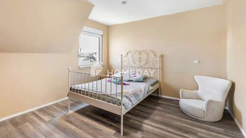 1. OG Schlafzimmer 1 - 