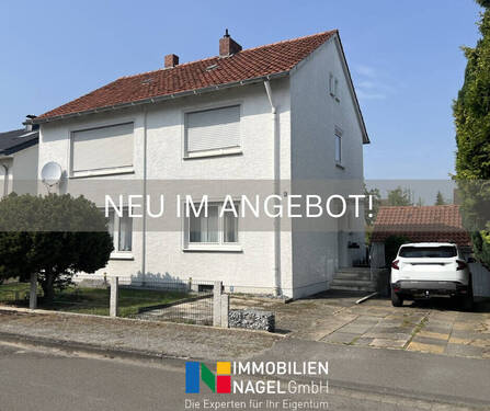 Neu im Angebot - Zweifamilienhaus in Kirchlengern - ruhige Sackgassenlage, großer Garten & Garage!