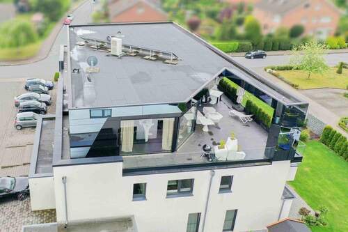 3 Außenansicht mit Dachterrasse - 3 Zimmer Einfamilienhaus in Oelde
