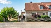 Außenansicht 1 - Familienfreundliche Doppelhaushälfte mit 5 Zimmern, Keller und schönem Garten