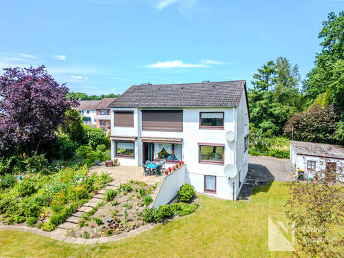 Gartenansicht - 6 Zimmer Mehrfamilienhaus, Wohnhaus zum Kaufen in Vögelsen