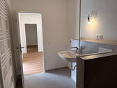 Bad mit Blick in den Flur - 