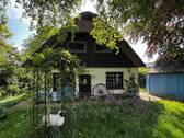 Objektansicht - Tradition trifft Wohnkomfort - Reetdachhaus auf großzügigem Grundstück! Ihr neues Zuhause im Grünen