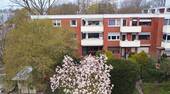 Hausansicht_ hinten - Eigentumswohnung mit Fernwärme in der beliebten Gartenstadt Süd zu verkaufen