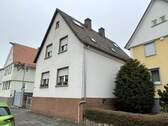 Straßenansicht - Mehrfamilienhaus, Wohnhaus zum Kaufen in Heuchelheim