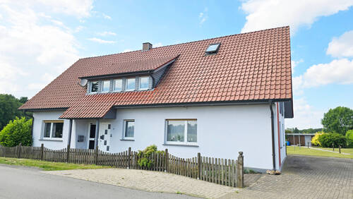 Straßenansicht 2 - Mehrfamilienhaus, Wohnhaus mit 220,00 m² in Bohmte zum Kaufen