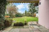 Garten mit überdachter Terrasse - 