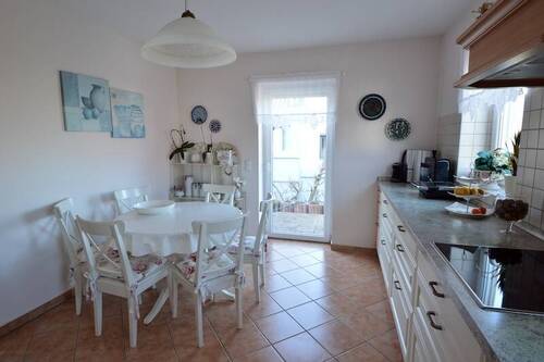 Küche mit Zugang zur Terrasse - 