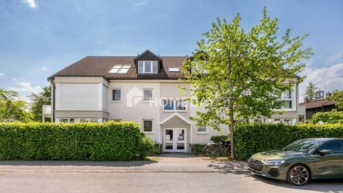 Außenansicht 1 - Sofort verfügbar: Charmante Erdgeschosswohnung mit Terrasse und Tiefgarage