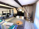 Wohnzimmer mit Treppe in das DG - 3 Zimmer Etagenwohnung in Ahrensbök