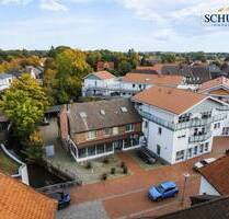 **Vielseitiges Gewerbeanwesen mit Wohnmöglichkeiten - Ihre Investition in Quakenbrück**