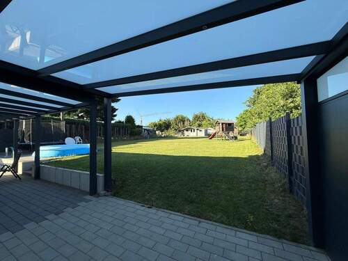 Sicht in den Garten - Einfamilienhaus mit 130,00 m&sup2; in Windhagen zum Kaufen