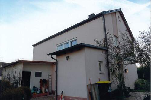 Hintere Wohnhausansicht - 4 Zimmer Mehrfamilienhaus, Wohnhaus in Wülfershausen an der Saale