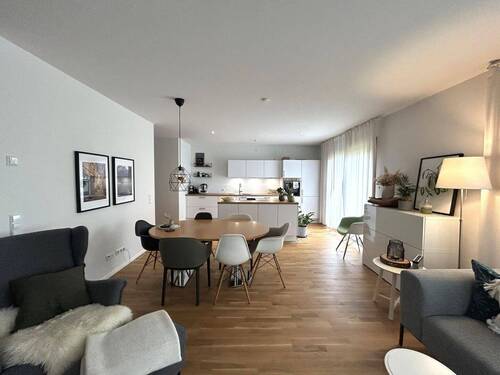 Wohnzimmer mit offener Küche - Etagenwohnung mit 114,50 m² in Bad Krozingen zum Kaufen