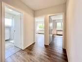 Flur mit Blick zu den Schlafzimmern - 