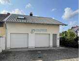 Hausansicht vom Innenhof - Einzelnes Garagenhaus in Teileigentum mit Zimmer und Bad, 2 Garagen und zusätzlichen Räumen im Souterrain!