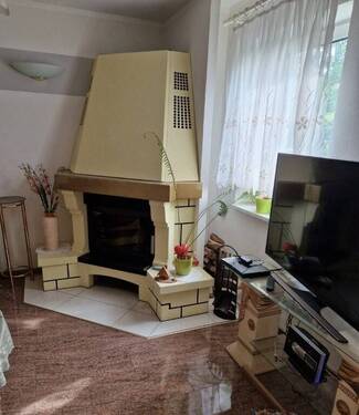 Wohnzimmer mit Kamin - 
