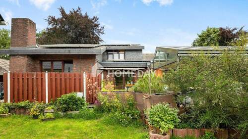 Außenansicht 1 - 8 Zimmer Mehrfamilienhaus, Wohnhaus in Hatten