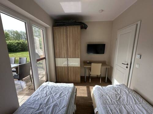 Schlafzimmer I im Erdgeschoss - 