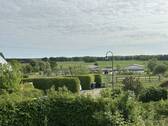 Blick vom Balkon über die angrenzenden Wiesen - 