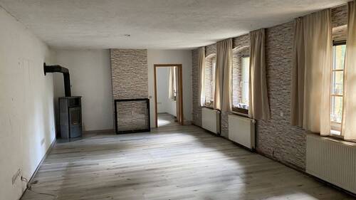 OG - Wohnzimmer mit Ofen - 