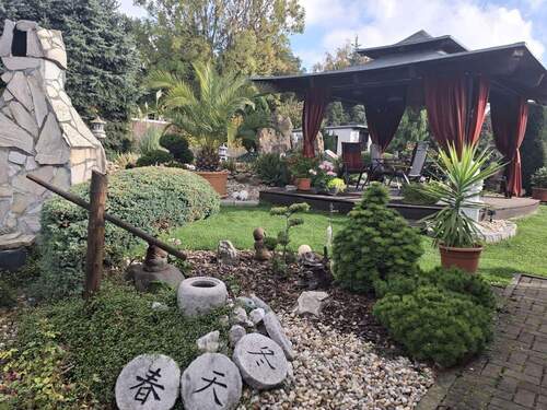 Titelbild - Einfamilienhaus mit ELW und Photovoltaik, sowie eigene Oase im Garten