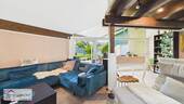 Wohnzimmer mit Zugang zur Terrasse - 