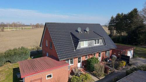 Seitenansicht - 8 Zimmer Mehrfamilienhaus, Wohnhaus zum Kaufen in Heidenau