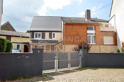 Häuseransicht - 1 Zimmer Mehrfamilienhaus, Wohnhaus zum Kaufen in Klein-Winternheim