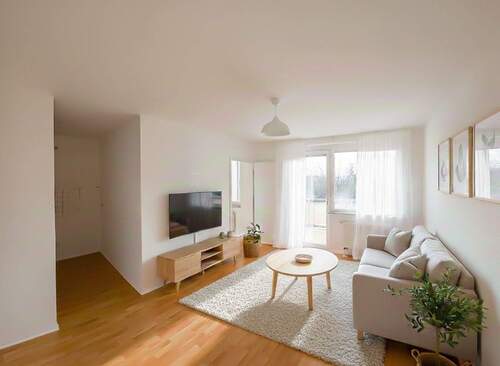 Wohnzimmer - Einrichtungsbeispiel.jpg - Einziehen und Wohlfühlen - gemütliche 2 Zimmer mit genialen Balkon ins Grüne!