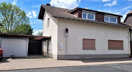 Haus und Garage - Wohnen und Arbeiten im Einklang. Wohn- und Geschäftshaus mit einer 3 Zimmer Wohnung, Büroetage und Garage!