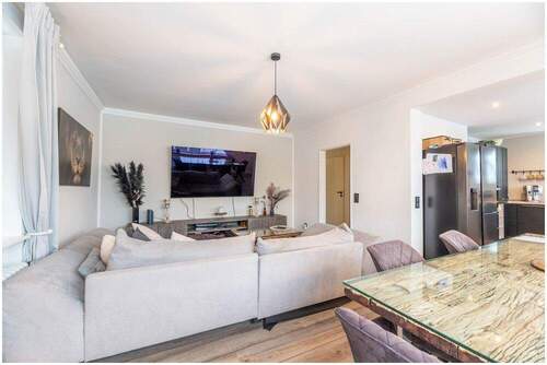 Flurbereich - Mehrfamilienhaus, Wohnhaus mit 165,00 m&sup2; in Uetersen zum Kaufen