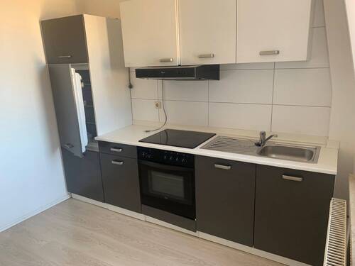 Einblick Küche - Etagenwohnung mit 60,00 m&sup2; in Fürth zur Miete