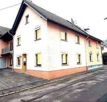 Charmantes Einfamilienhaus mit Garage, Scheune und zusätzlichem Gartengrundstück in Großlittgen